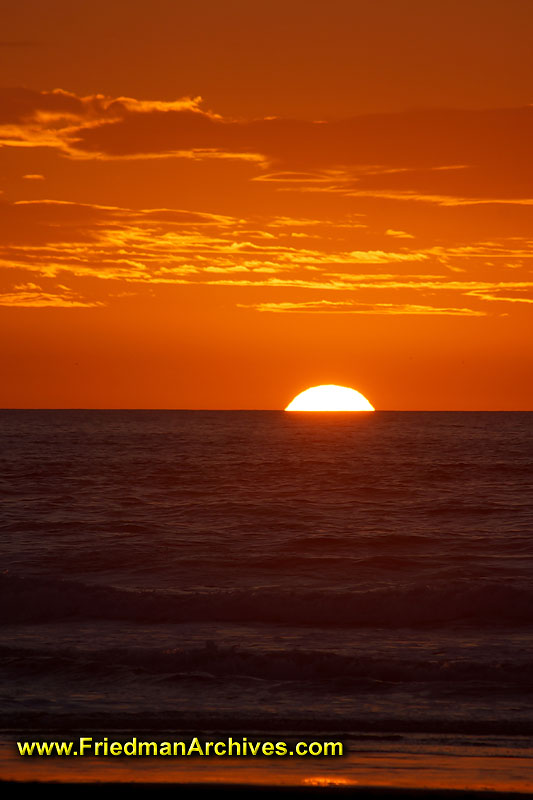 ocean,sunset,orange,water,beach,sun,clouds,